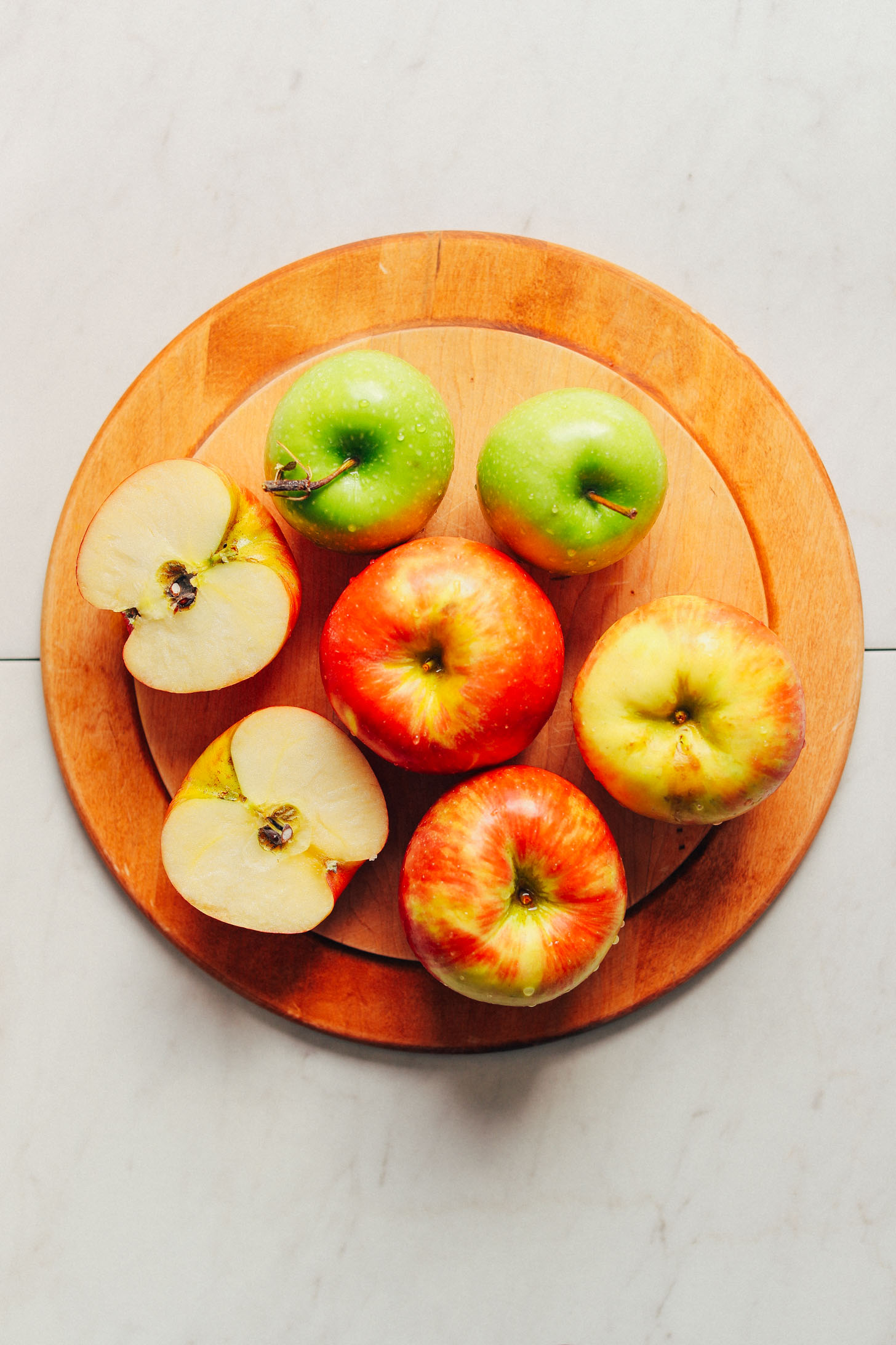 Wood cutting board with sweet and tart apples