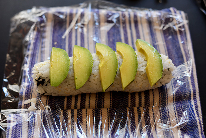 Showing How to Make Sushi with rice on the outside