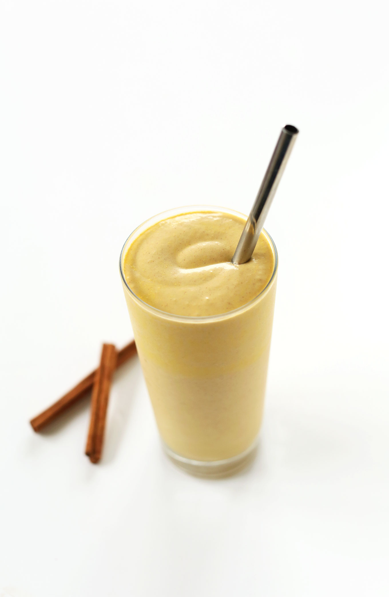 Glass of vegan Pumpkin Bourbon Milkshake