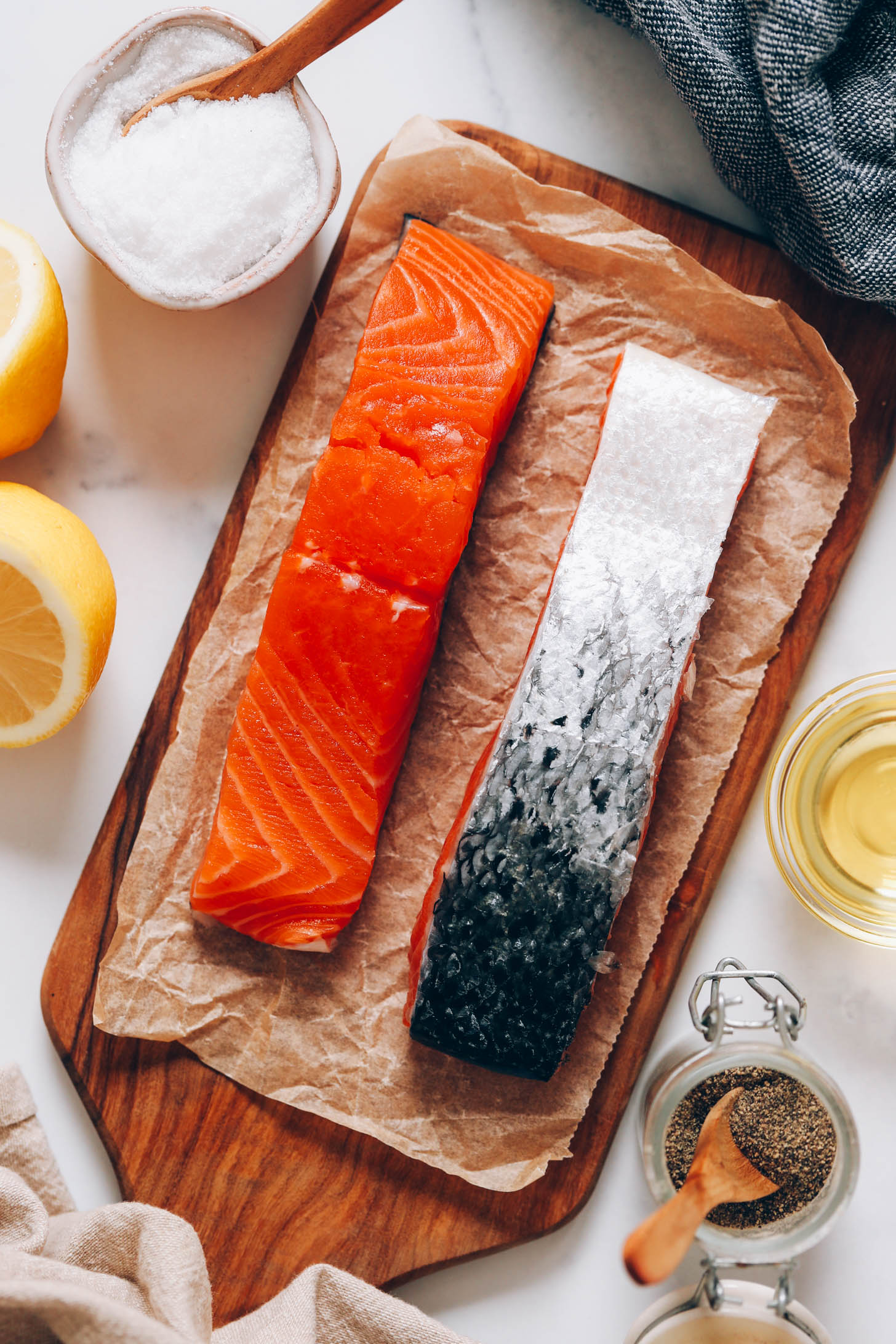 Lemon, salt, avocado oil, black pepper, and salmon filets