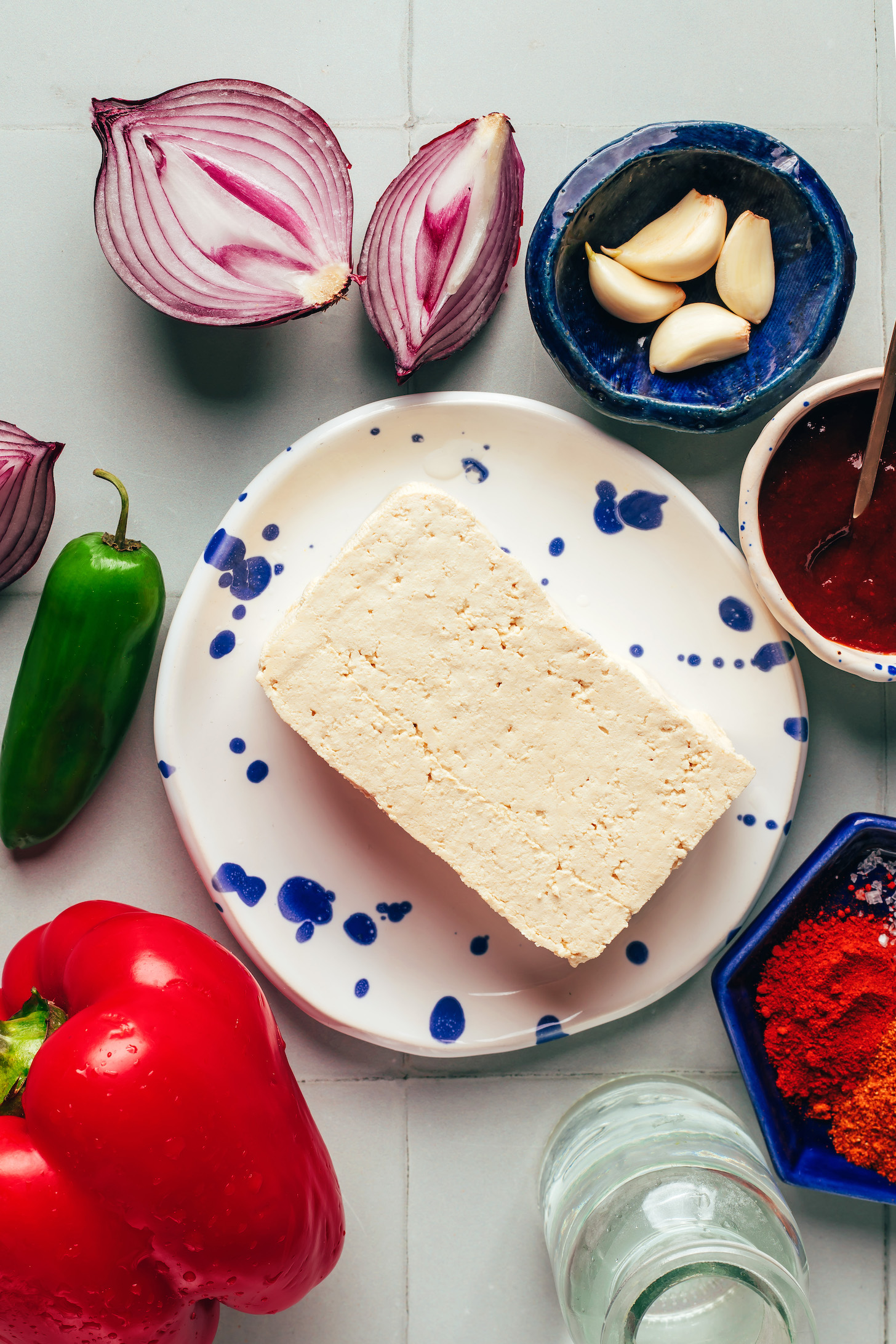 Red onion, garlic, adobo sauce, spices, water, tofu, red bell pepper, and jalapeño