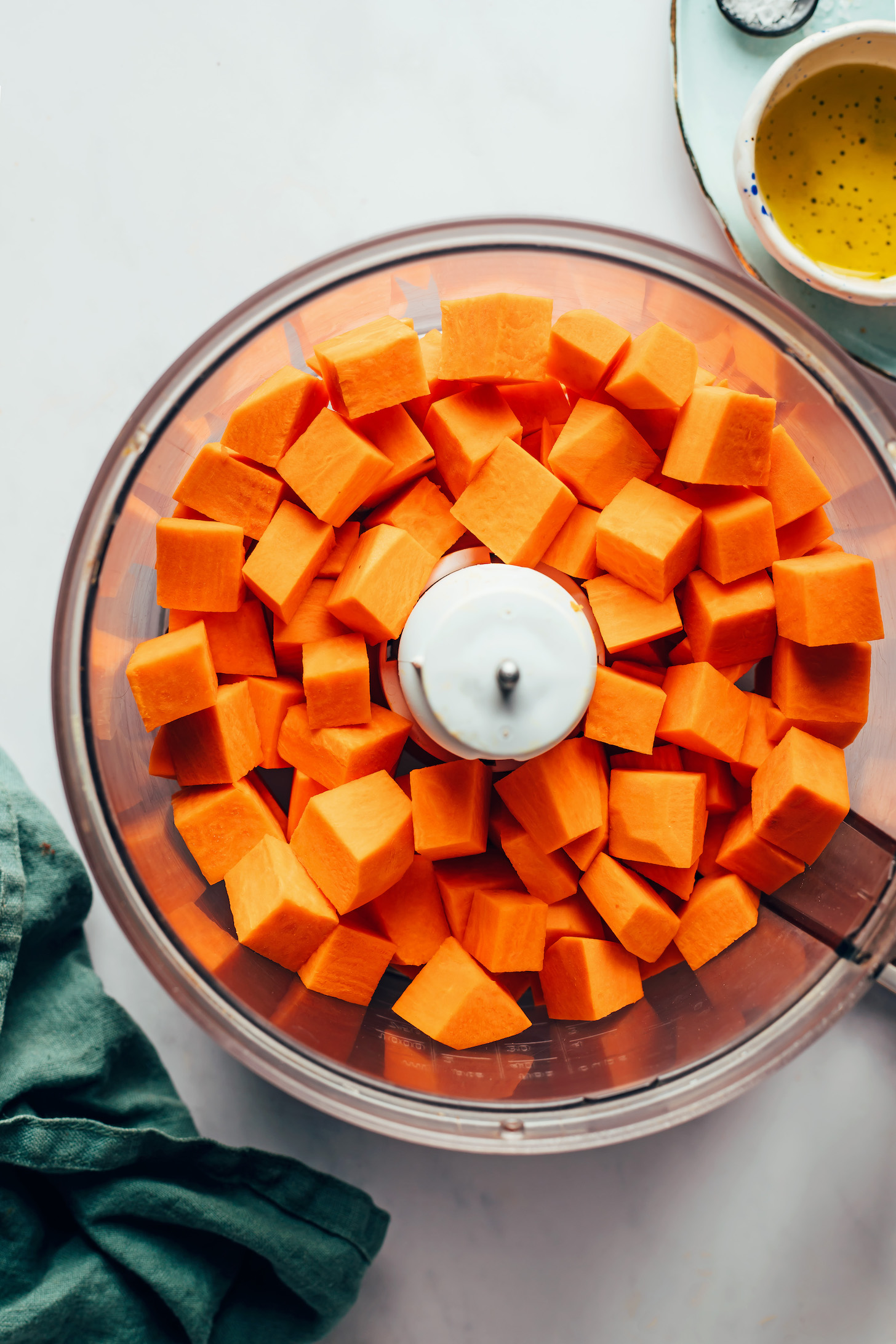 Cubed sweet potato in a food processor